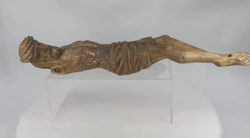 360-degree rotating view of a 17th-century Spanish Colonial carved wooden Christ figure, highlighting expressive carving, aged surface, and remaining traces of original polychrome across the entire sculpture