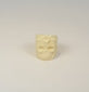 360-degree view of hand-carved camel bone skull ring with floral decoration, sculptural details, and natural bone texture