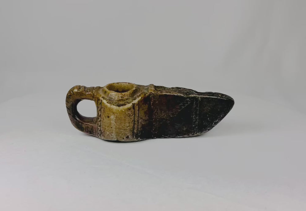 360-degree view of an ancient Islamic stone oil lamp carved with geometric motifs, early Islamic period, circa 7th–12th century CE