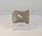 360-degree rotating view of a Pre-Columbian Andean notched stone axe from Ecuador or Peru, circa 500–1500 CE, showing its hafting notches, beveled edge, and aged surface.