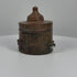 360-degree rotating video of an antique Islamic Khorassan bronze inkwell dating to the 10th–12th century CE, featuring a cylindrical body, domed lid with rounded finial, finely engraved floral and geometric patterns, decorative side fittings, and rich green and reddish-brown patina. An example of medieval Islamic metalwork from the Islamic Golden Age, shown from multiple angles.