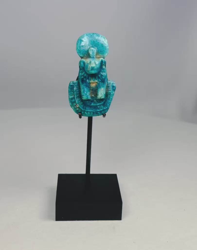 Ancient Egyptian faience amulet depicting Sekhmet, lion-headed goddess of war and protection, turquoise-blue in color with tripartite wig, dual suspension holes, Third Intermediate to Late Period, circa 1070–664 BCE.