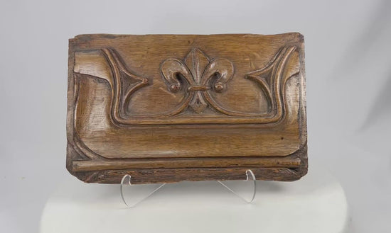 360-degree rotating video view of a 16th-century carved oak Gothic panel featuring a central fleur-de-lis motif.