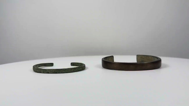 Ancient bronze and iron bracelet pair dating to the 1st–3rd century AD, shown from multiple angles in a Relic &amp; Rarity artifact video.