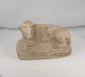 Rotating view of an ancient Egyptian terracotta reclining lion from Alexandria, dating to the Ptolemaic Period, circa 3rd–2nd century BCE