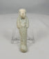 Rotating view of an authentic Late Period Egyptian faience ushabti, showing mummiform stance, crossed arms, aged glaze remnants, and mineral burial deposits.