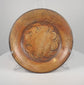 Rotating view of Pre-Columbian Greater Nicoya painted ceramic plate showing geometric interior decoration and striped underside