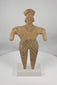 Ancient Colima terracotta female figure from West Mexico, dating to circa 300 BCE–300 CE, featuring black pigment decoration, an elaborate headdress, applied jewelry details, and mounted on a custom display stand. The video concludes with original 1985 Harmer Rooke Galleries provenance documentation and period collection photographs.