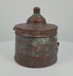 360-degree rotating video of an antique Islamic Khorasan bronze inkwell dating to the 10th–12th century CE, featuring intricate engraved floral and geometric motifs, traditional Islamic metalwork, and a rich natural bronze patina. A historical writing instrument from the Islamic Golden Age, showcasing its decorative craftsmanship and age-related surface details from multiple angles.