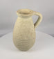 Ancient Roman North African terracotta pitcher from modern Tunisia displayed in a rotating 360-degree view, highlighting its rounded body, ribbed decoration, recessed neck, broad flaring rim, loop handle, archaeological patina, and Roman Imperial craftsmanship.