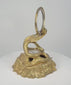 360-degree video showing a Victorian gilt bronze cobra inkstand designed by Benjamin Waterhouse Hawkins, featuring a coiled snake form, circular thermometer, compass, pocket-watch hook, pen holder, and detailed mid-19th-century decorative casting.