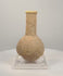 360-degree rotating view of an attributed Roman Imperial stone unguentarium, circa 1st–3rd century CE, featuring a rounded bulbous body, elongated cylindrical neck, thick flared rim, and weathered beige stone surface. The video highlights the vessel’s distinctive shape and porous texture.
