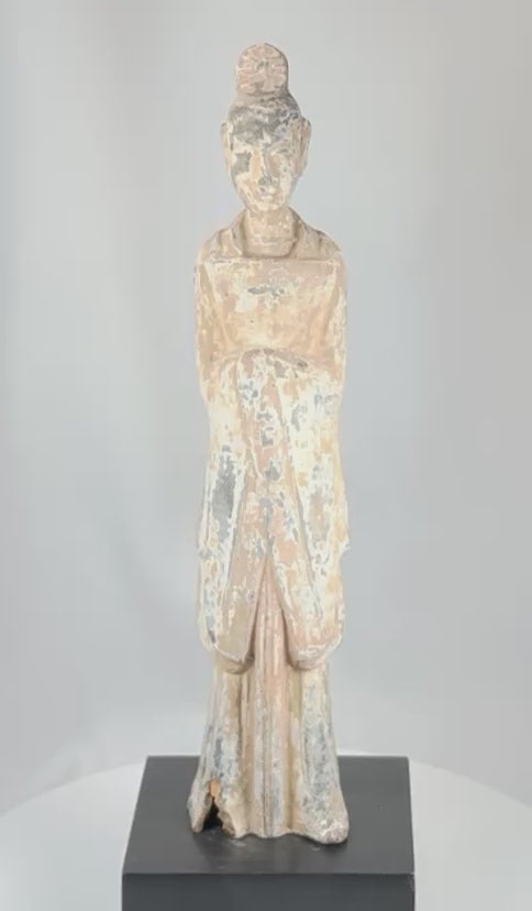 360 degree view of an ancient Chinese Northern Wei Dynasty earthenware funerary attendant figure with remnants of polychrome pigments and traditional court attire.