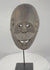 Rotating video of a West Timor ritual mask from Fatuleu Village, circa 1930, displaying traditional Atoni carving traditions, large pierced eyes, an open mouth with protruding tongue, and an aged hardwood surface.