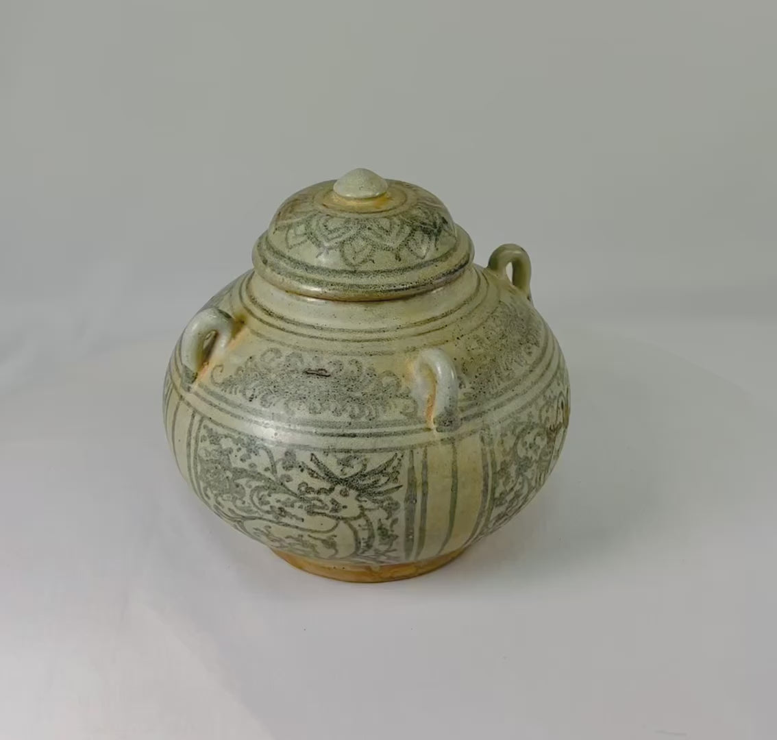 Sawankhalok glazed stoneware bowl from Thailand, 14th–16th century CE. Features dark underglaze decoration with birds, beasts, and floral motifs. Rounded form with smooth glaze, reflecting Sukhothai-era craftsmanship and Southeast Asian cultural influences. Excellent preserved condition with minor age wear.