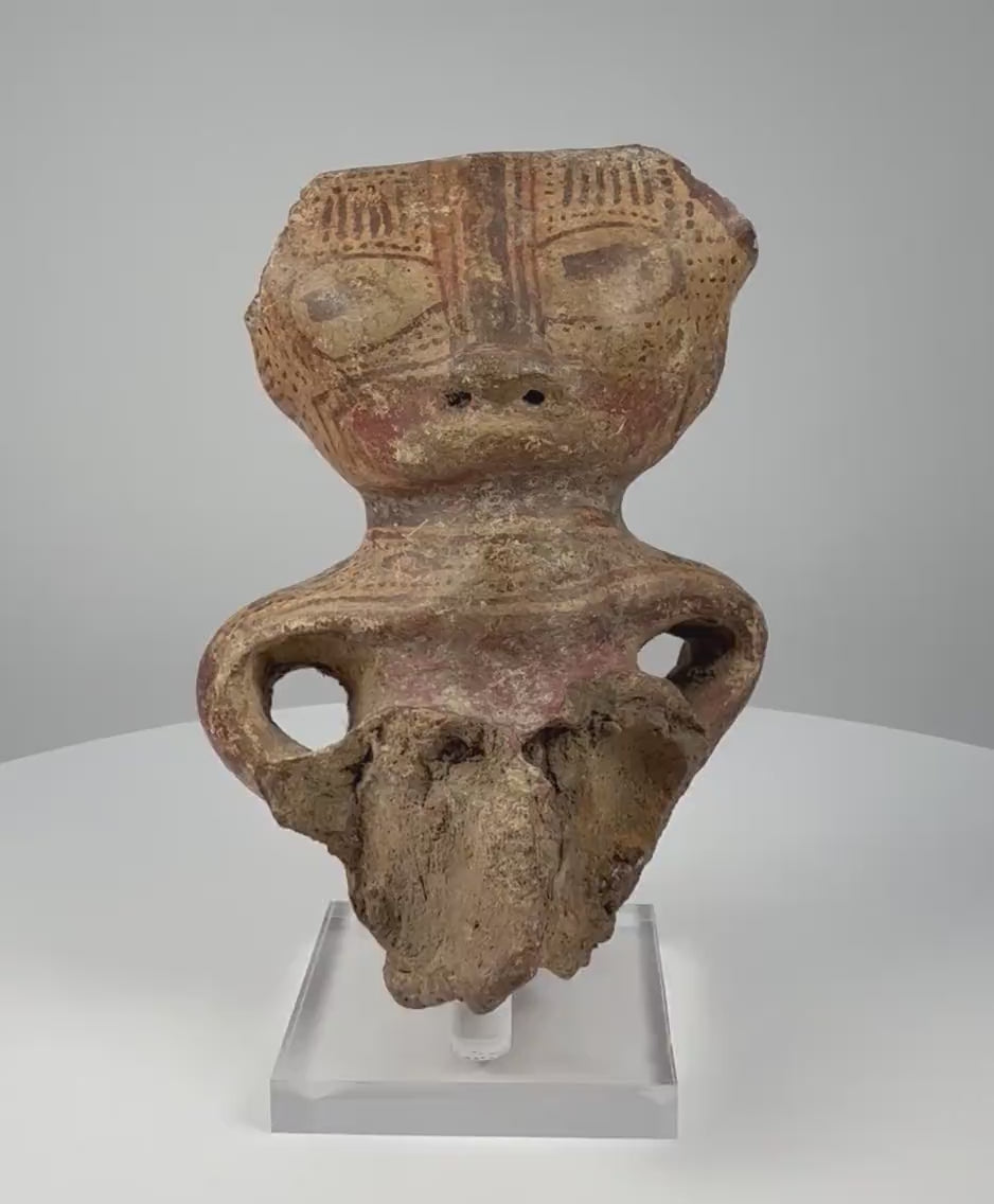 Pre-Columbian West Mexican terracotta figurine fragment with painted facial decoration, circa 300 BCE–300 CE, shown in rotating 360-degree video.