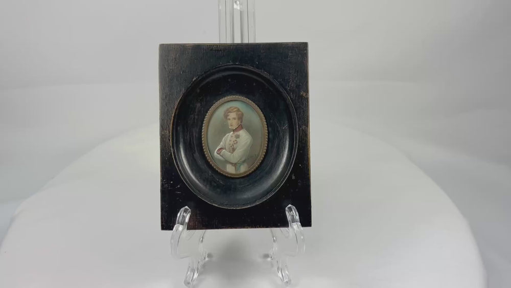 360-degree rotating view of a mid–late 19th century miniature portrait of Napoleon II in Austrian uniform, gouache on wafer under glass, set in original ebonized wood frame with brass bezel.