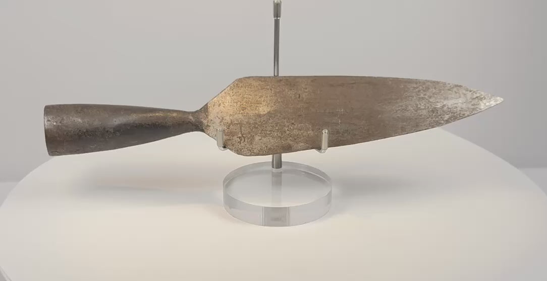Video showing multiple angles of an 18th-century Indo-Persian forged iron spearhead with broad leaf-shaped blade, tapered socket and aged patina