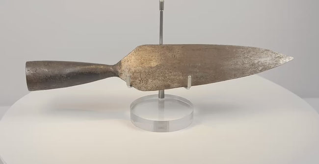 Video showing multiple angles of an 18th-century Indo-Persian forged iron spearhead with broad leaf-shaped blade, tapered socket and aged patina