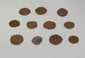 Video showcasing eleven medieval Crusader-era copper-alloy coins from circa 11th–13th century CE, highlighting their irregular shapes, worn inscriptions, historical designs, and naturally aged patination.