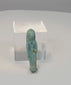 Video showing multiple views, feline features and turquoise-blue glaze details of an ancient Egyptian Sekhmet or Bastet faience amulet