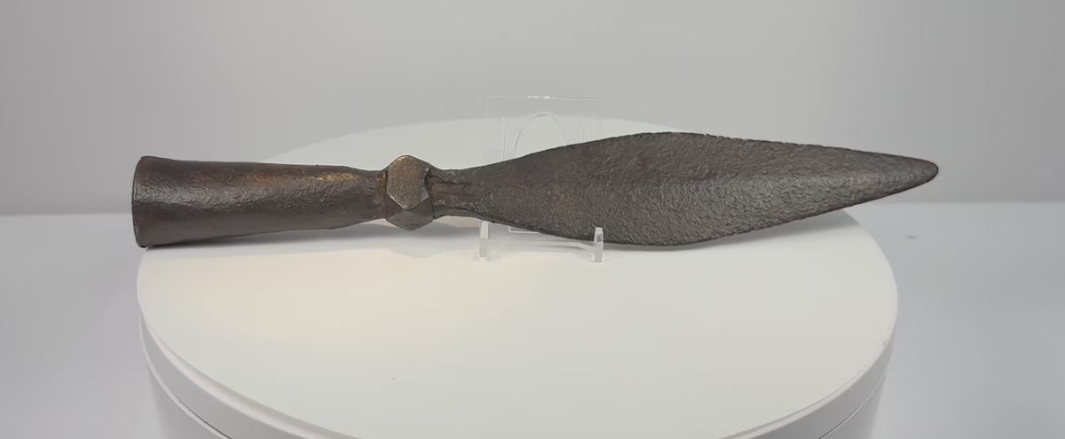 Video showing multiple angles of an 18th-century Qing Dynasty Chinese iron spearhead with a broad leaf-shaped blade, socketed base and aged patina