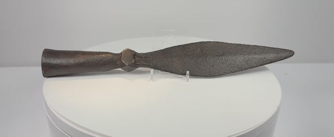 Video showing multiple angles of an 18th-century Qing Dynasty Chinese iron spearhead with a broad leaf-shaped blade, socketed base and aged patina