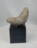 360 degree rotating view of an authentic Pre-Columbian ground stone tool artifact from ancient Mesoamerican culture mounted for display