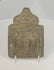 Rotating view of an antique Russian Orthodox bronze travel icon panel depicting Saints Blaise and Athanasius beneath Christ enthroned, showing detailed casting, Church Slavonic inscriptions, decorative ornamentation, and aged patina dating to the Russian Empire, circa 1850–1890.