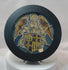 Video showing a Renaissance-era Swiss stained glass panel depicting an angel presenting a heraldic shield, with vivid blue, gold, red, and white glass, detailed leadwork, and views of the panel illuminated within its custom lightbox frame.
