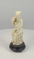 360-degree video of an antique Chinese Zhang Guolao Eight Immortals figure with a fish drum and ebonized wooden base