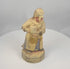 Rotating presentation of an antique Chinese polychrome wooden attendant holding a ceremonial vessel, with a tall headdress and surviving Qing Dynasty pigment.