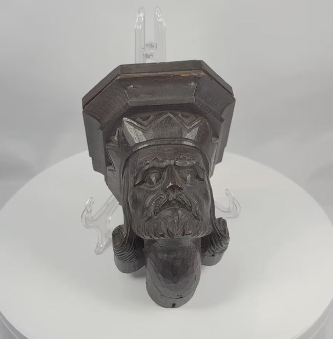 360-degree view of a 19th-century Gothic Revival carved wooden corbel depicting a stern bearded king with a crown-like architectural headpiece.