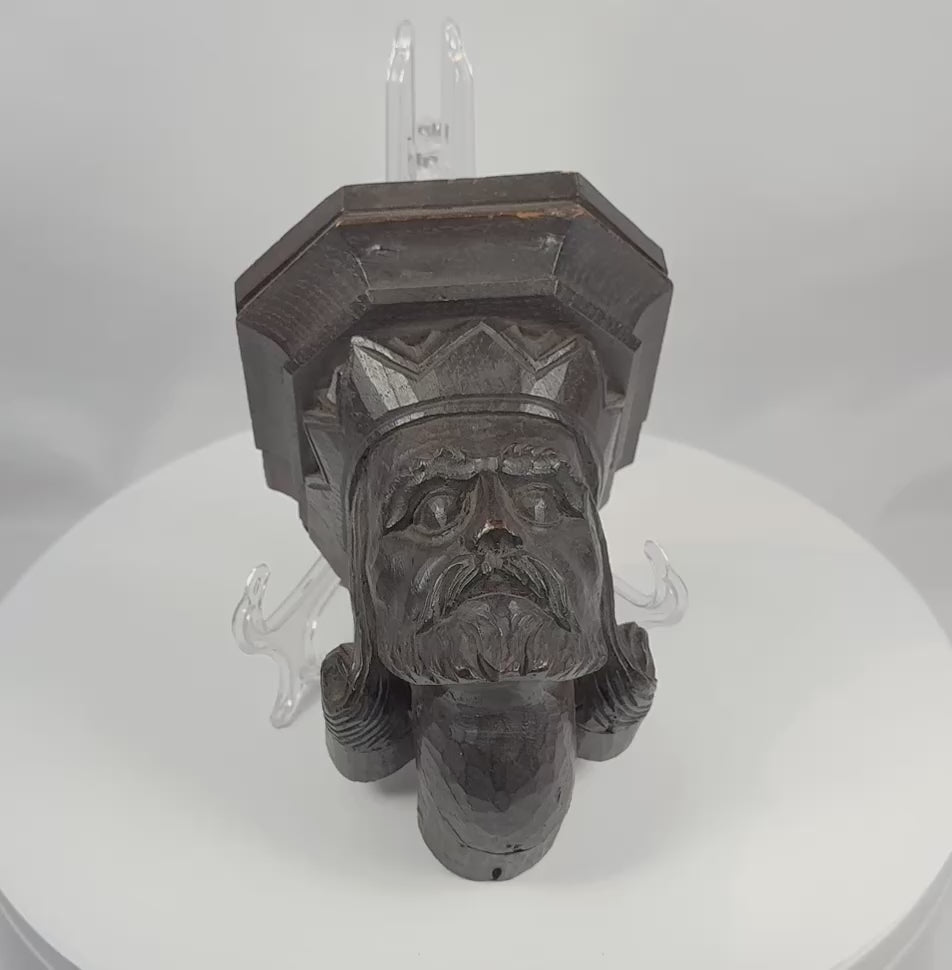 360-degree view of a 19th-century Gothic Revival carved wooden corbel depicting a stern bearded king with a crown-like architectural headpiece.
