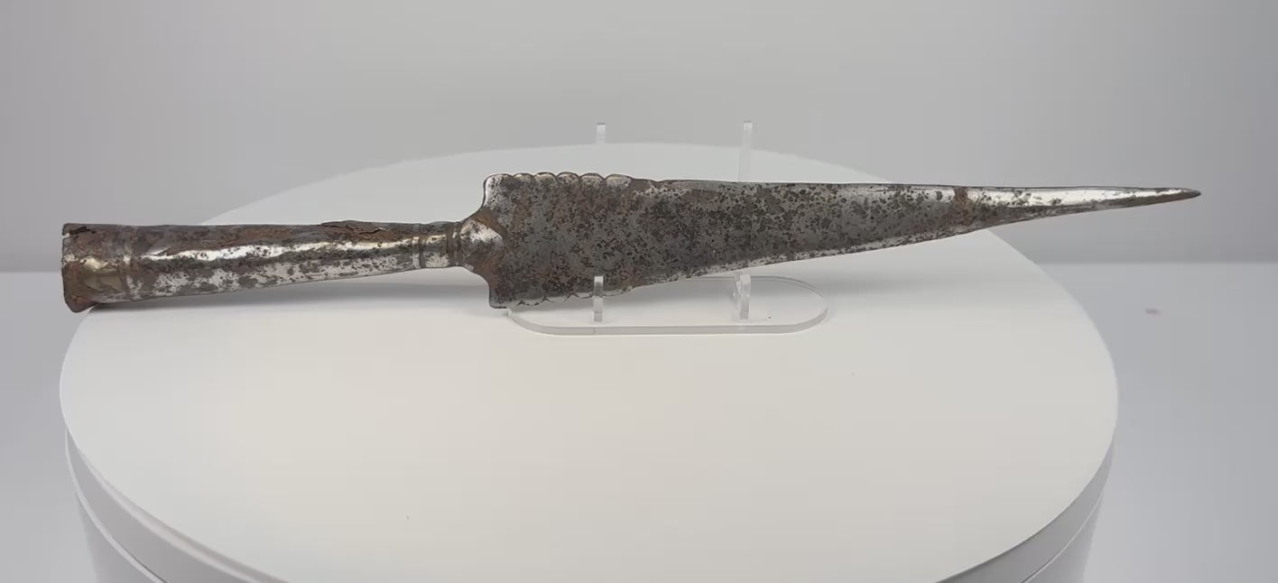 Ancient European iron spearhead with scalloped-edge blade and socketed base, circa 1st millennium CE