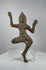 Antique South Asian bronze dancing deity sculpture dating to circa 12th–18th century CE, featuring a graceful dancing posture, serene facial features, an ornate headpiece, flowing ceremonial attire, intricate ornamentation, and naturally aged green patina.