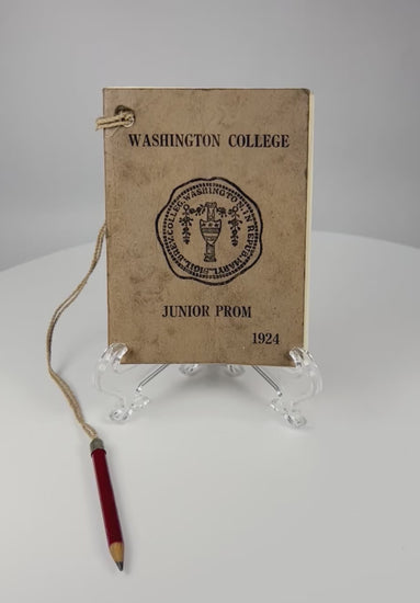 360-degree view of a 1924 Washington College Junior Prom dance card booklet with attached miniature pencil and handwritten dance partners