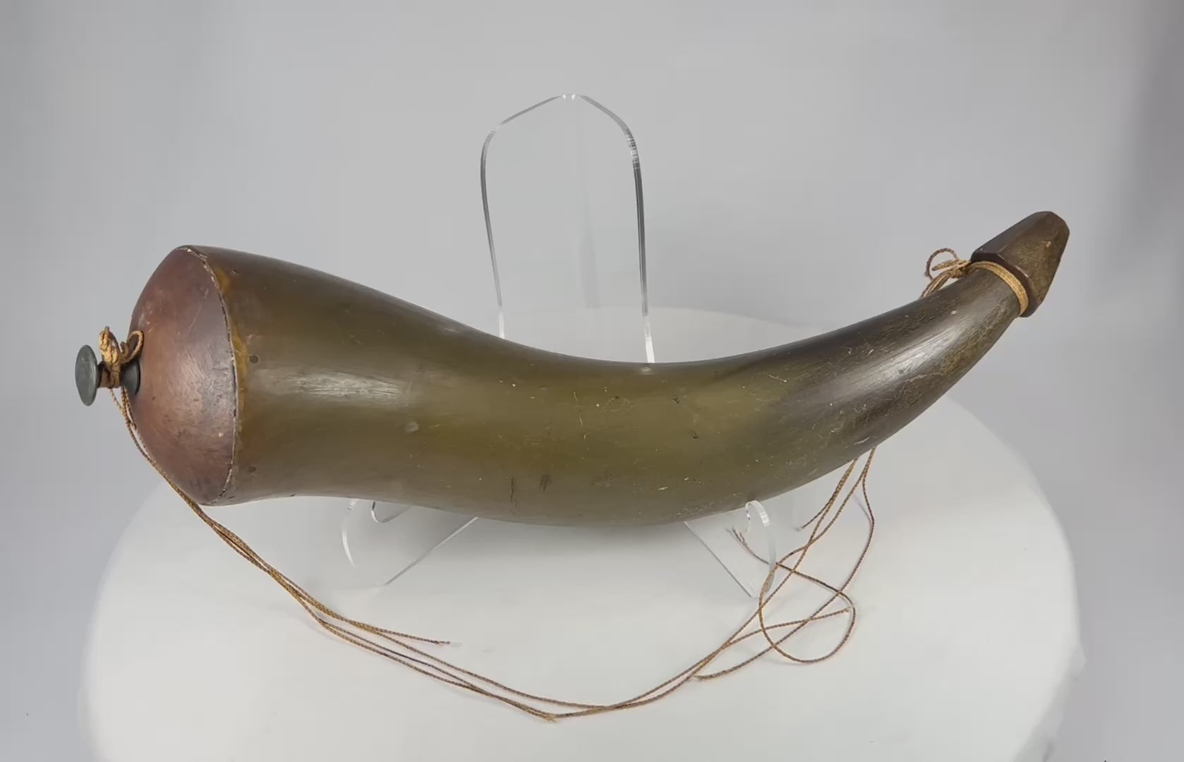 360-degree view of antique horn powder vessel with wooden stopper and aged patina