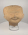 Pre-Columbian Veracruz Sonriente terracotta head with smiling expression, scroll-motif headdress and hollow ceramic construction
