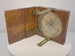 Rotating 360-degree video of a mid-19th-century Thomas Jones Liverpool alidade compass, showing the open walnut case, silvered degree ring, magnetic needle, brass sighting arms, fittings, and exterior case.