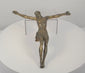 360-degree rotating view of an antique European gilt-bronze Corpus Christi crucifix figure, dating to the 16th–17th century. Depicts Jesus Christ with outstretched arms, bowed head, elongated anatomy, crossed feet, and a finely sculpted draped loincloth. The rotation reveals surviving historic gilding, aged bronze patina, intricate sculptural details, and the reverse of this Renaissance to early Baroque religious artifact.