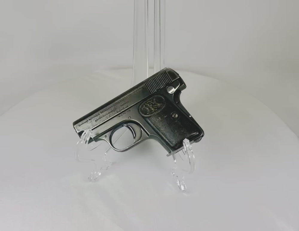 360-degree rotating view of a pre–World War I FN Browning Model 1906 pocket pistol, serial 368133, showing triple safety features, factory blued steel finish, and checkered grips.