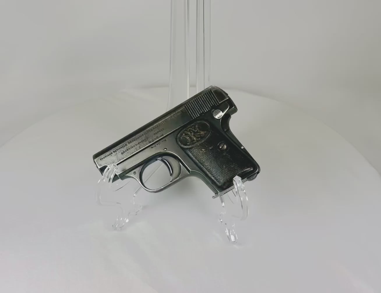 Browning FN Model 1906 pocket pistol, serial #368133, Belgium, circa 1912–1914. Third-variant “Triple Safety” design with grip, manual, and magazine safeties. Early 20th-century collectible semi-automatic handgun, deactivated for safe display.