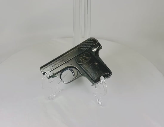 Browning FN Model 1906 pocket pistol, serial #368133, Belgium, circa 1912–1914. Third-variant “Triple Safety” design with grip, manual, and magazine safeties. Early 20th-century collectible semi-automatic handgun, deactivated for safe display.