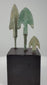 360-degree view of three ancient Western Asian bronze projectile points from the Late Bronze Age to Early Iron Age, highlighting their lanceolate, winged, and barbed blade designs, surviving tangs, and archaeological patina.