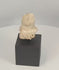 360-degree view of a Pre-Columbian terracotta female figure fragment featuring a large ceremonial headdress, stylized facial features, and symbolic fertility attributes, Mesoamerica, circa 300 BCE–600 CE.