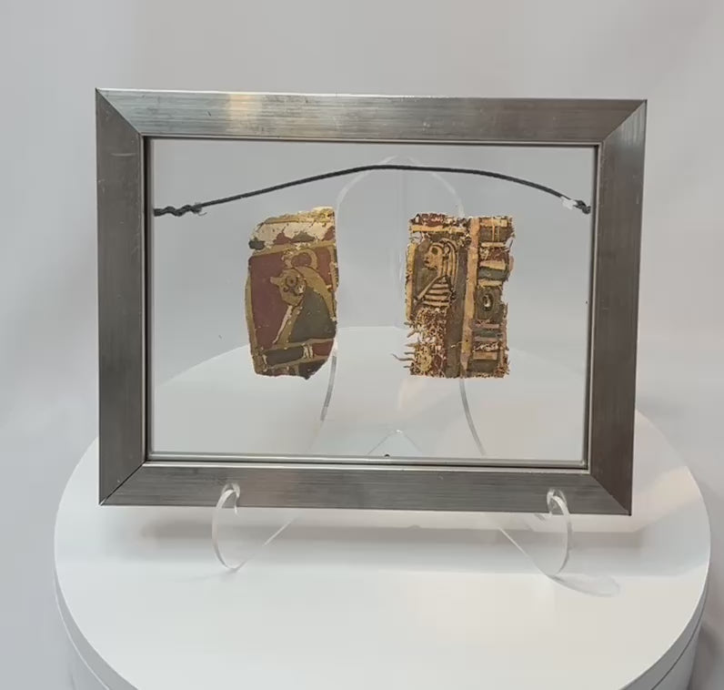 Ancient Egyptian polychrome coffin fragments in framed display rotating view showing painted surfaces and linen backing