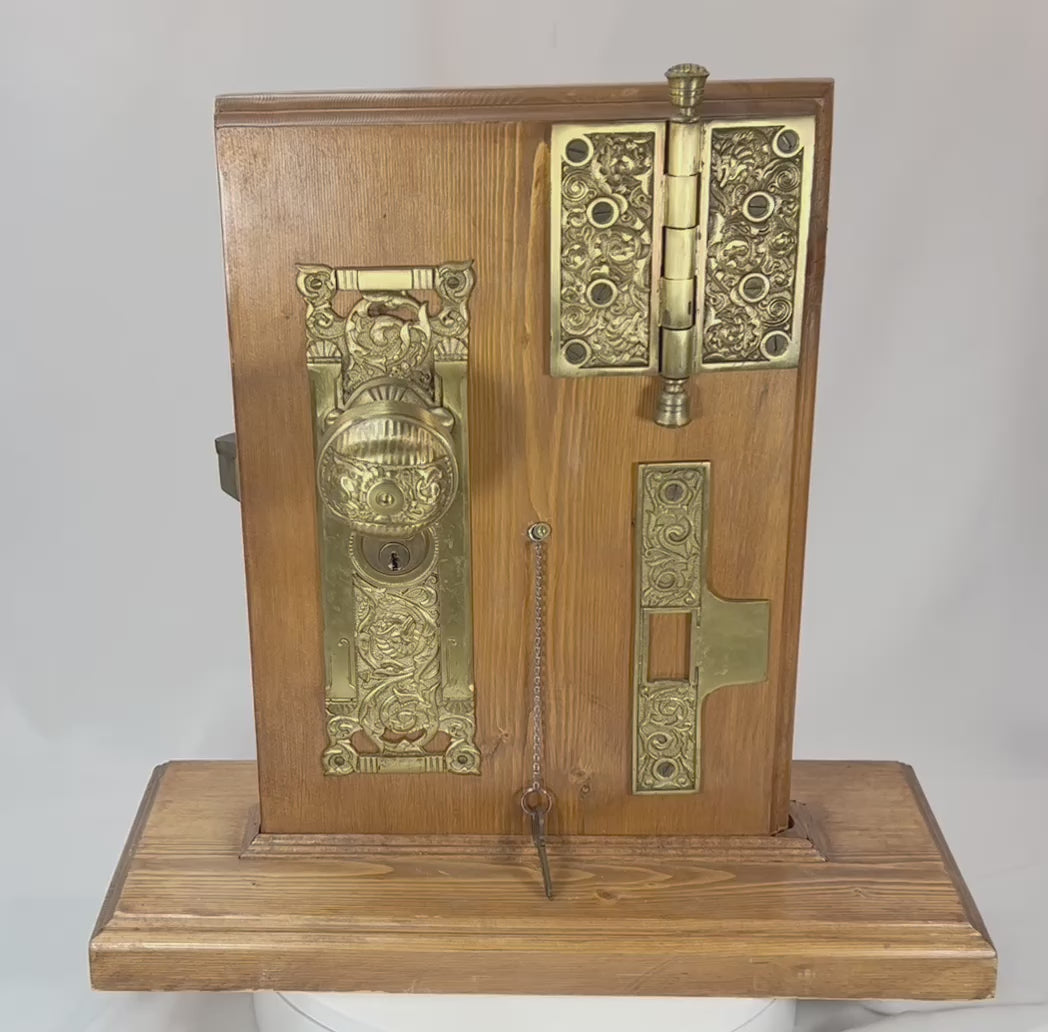 Antique Reading Hardware door lock display rotating view showing brass knob, hinge, and mortise mechanism