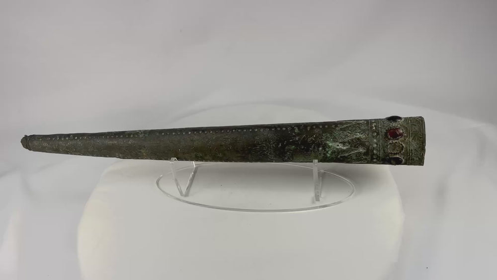 Dense, smooth, spherical stone object from ancient South Asia, likely used as a grinding or pounding tool, circa 2nd millennium BCE, showing natural patina and wear.