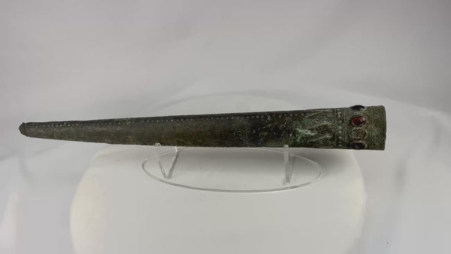 Dense, smooth, spherical stone object from ancient South Asia, likely used as a grinding or pounding tool, circa 2nd millennium BCE, showing natural patina and wear.